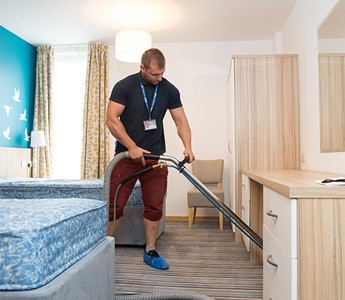 commercial cleaning expert while working in a London property