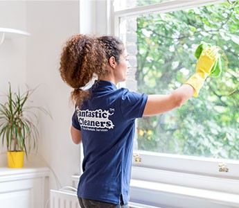 Cleaner while working in a London business property